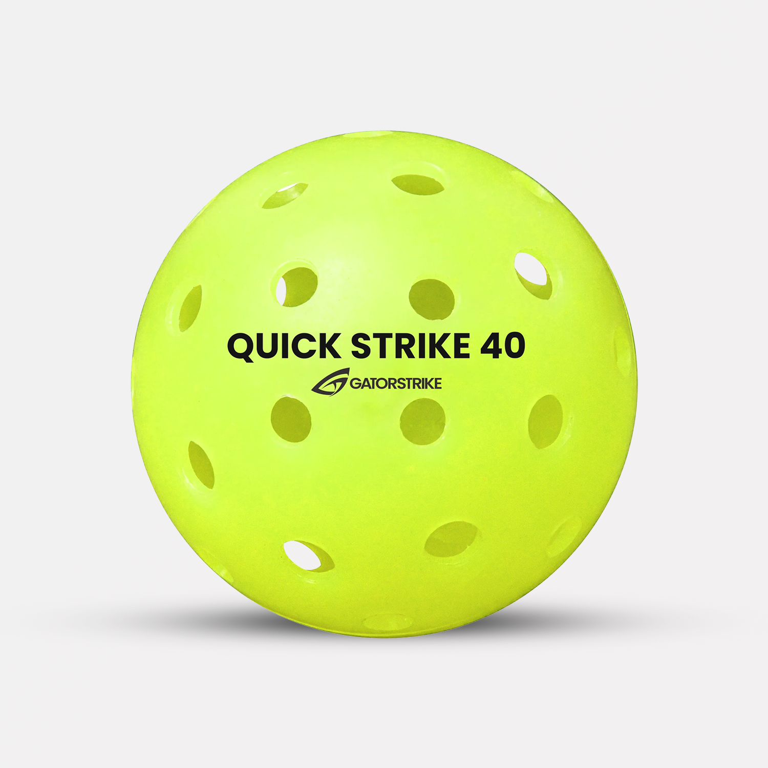 Green pickleball with 'Quick Strike 40' and 'GatorStrike' text on a light gray background