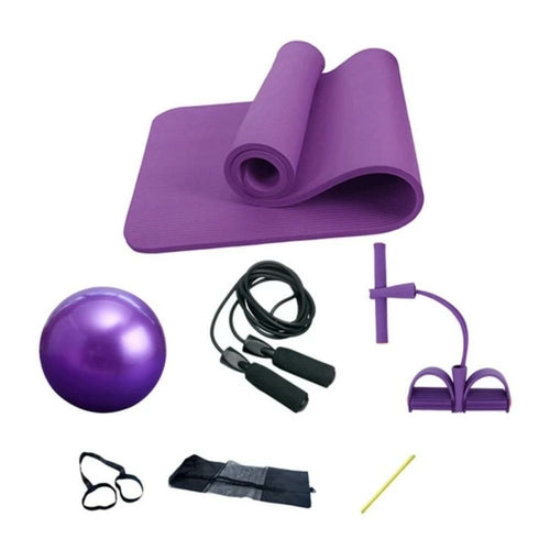 Purple exercise mat, ball, jump rope, resistance bands, and other fitness tools on a white background